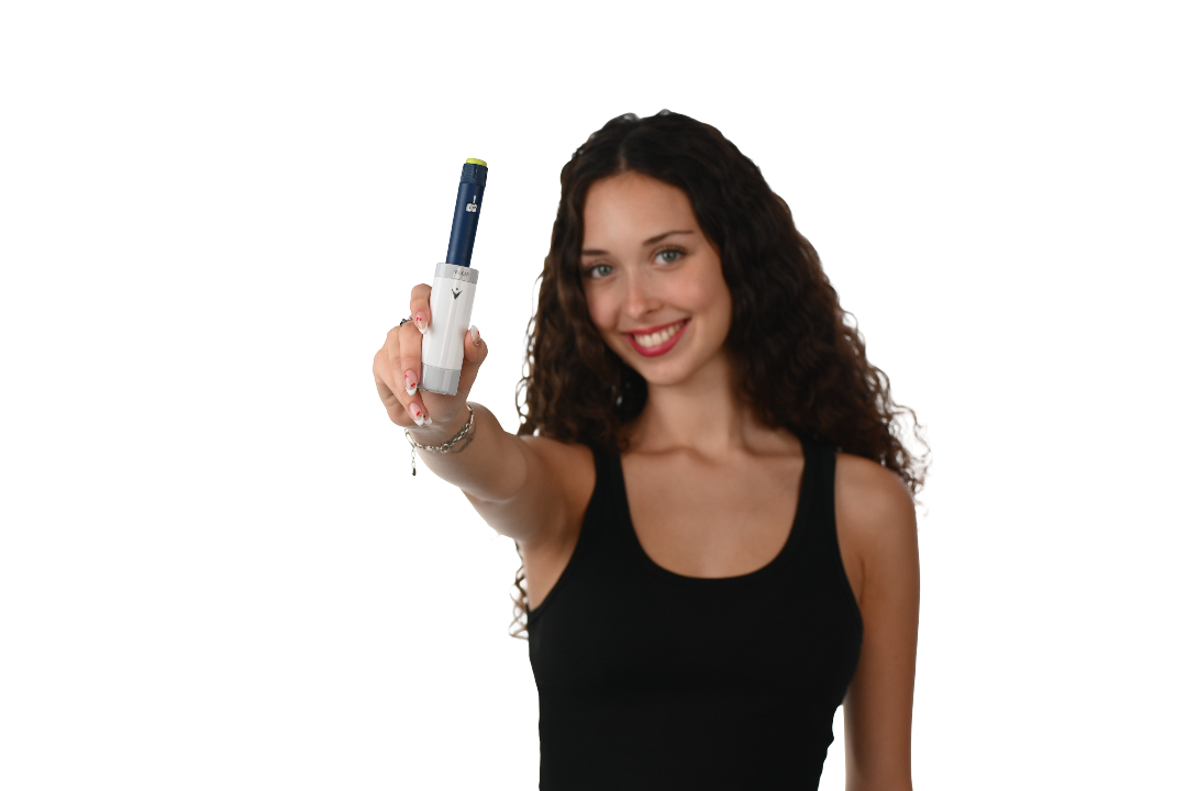Woman holding VIVI Cap insulin cooling device